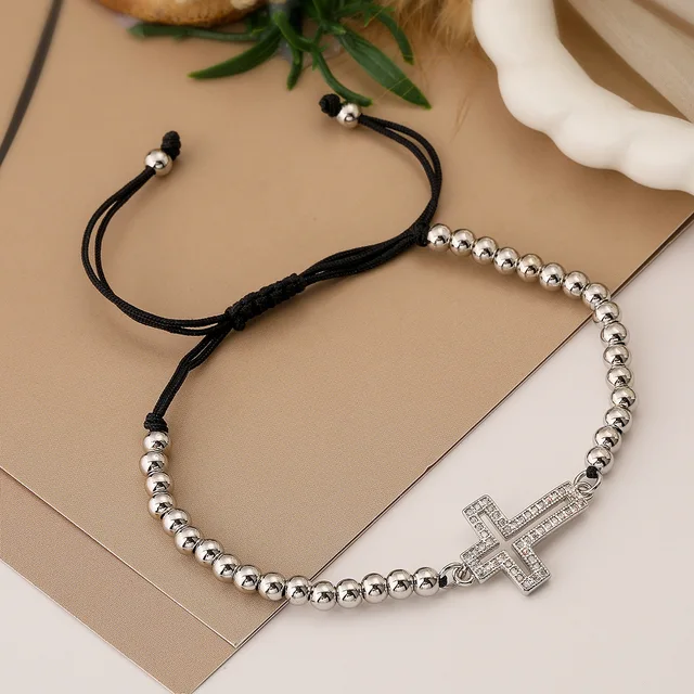 Bracelet with a metal cross
