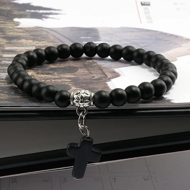 Bracelet made of natural black stone with a cross