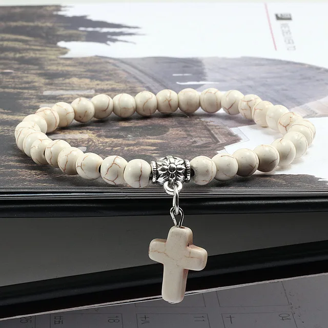 Bracelet made of natural white stone with a cross