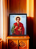 Icon "Saint Panteleimon" on a wooden base