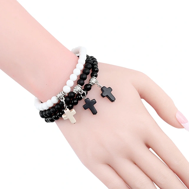 Bracelet made of natural white stone with a cross