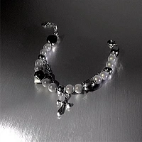 Reflective bracelet with a cross