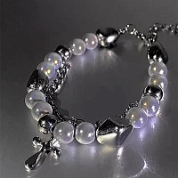 Reflective bracelet with a cross
