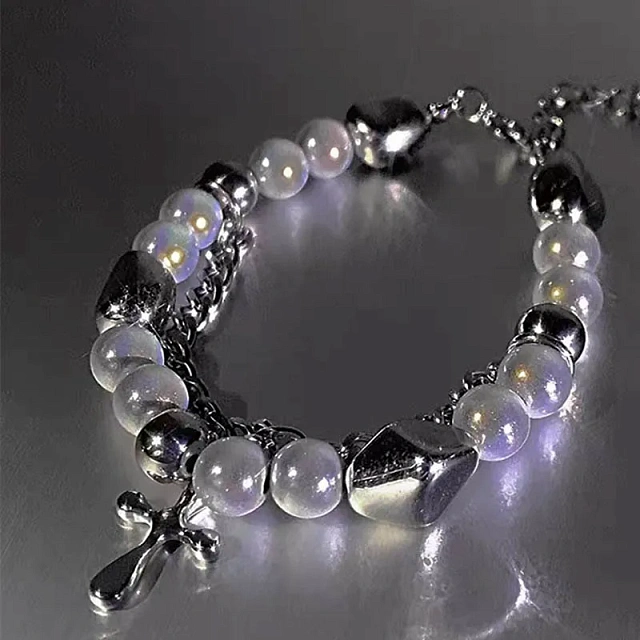 Reflective bracelet with a cross