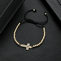Bracelet with a metal cross