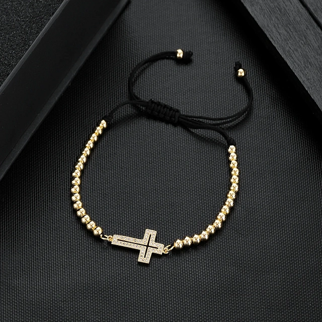 Bracelet with a metal cross