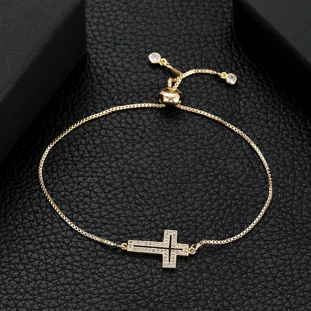 Metal bracelet with a cross